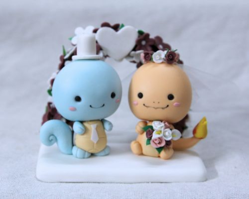 Picture of Pokemon Wedding Cake Topper with Arch,  Squirtle and Charmander Cake Topper