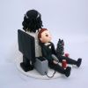 Picture of Bride dragging groom gamer Wedding Cake Topper, Wedding Cake Topper with a cat 