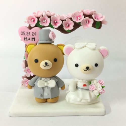 Picture of Rilakkuma wedding cake topper with Cherry Blossom Arch, Japanese Inspired Wedding Cake Decor, Sakura theme Cake Topper