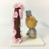 Picture of Rilakkuma wedding cake topper with Cherry Blossom Arch, Japanese Inspired Wedding Cake Decor, Sakura theme Cake Topper