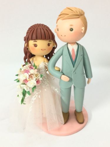 Picture of Fringe Bride & Blonde Groom Wedding Cake Topper, Pastel Themed Wedding Centerpiece 