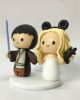 Picture of Star Wars & Mickey wedding cake topper, Bride with Blaster and Groom with Lightsaber topper