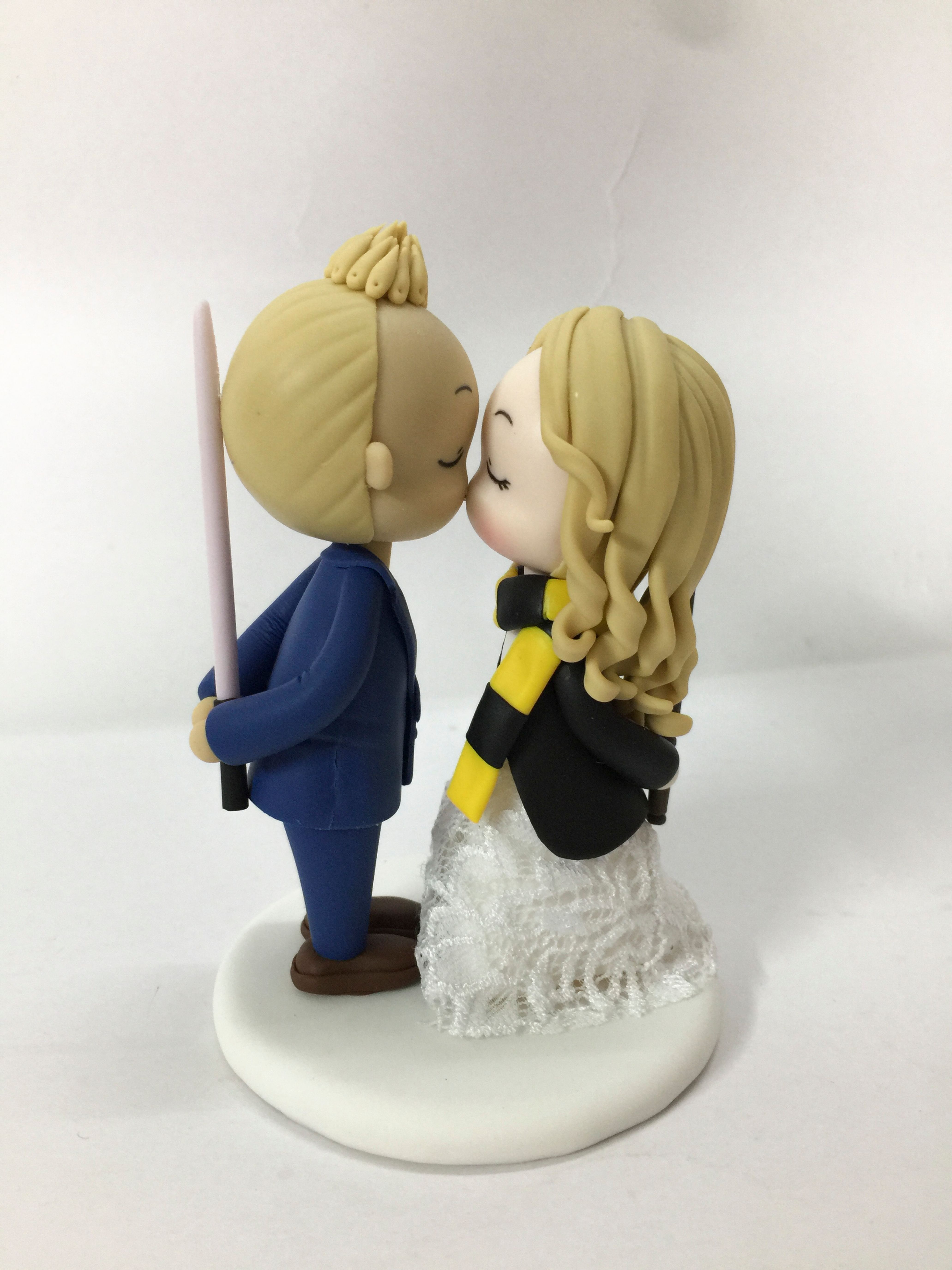 Picture of Gryffindor House Bride & Lightsaber Groom Wedding Cake Topper, Harry Potter & Star Wars Wedding Theme