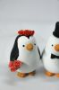 Picture of Interracial Penguin Wedding Cake Topper, Red Theme Wedding Cake Decoration